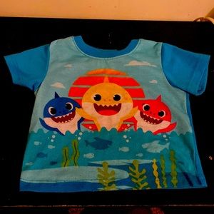 Today I am selling a baby shark pajama top is for a toddler